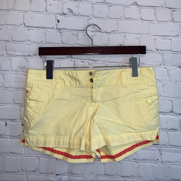 American Eagle Outfitters Pants - American Eagle Yellow & Orange Stretch shorts sz 4